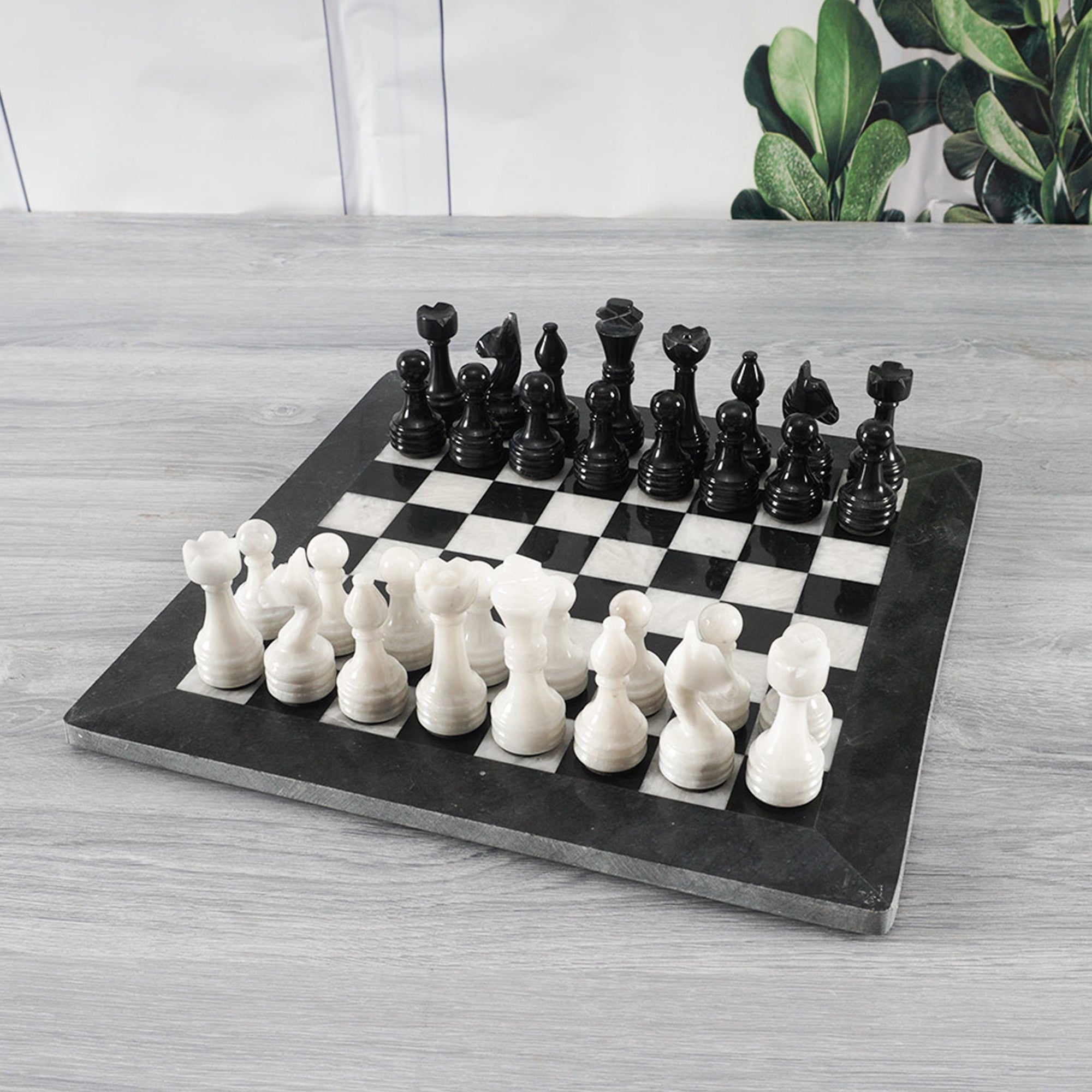 CHESS BOARD Chess board in ceramic, black and white with…